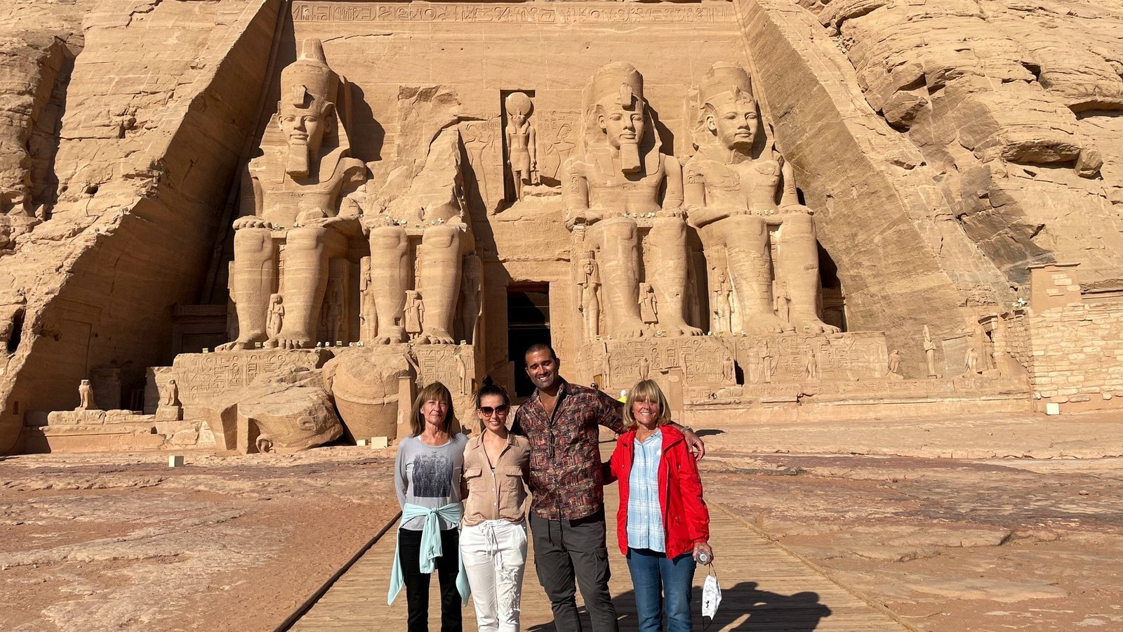 A Nile Experience Egyptologist with guests at an Egyptian monument